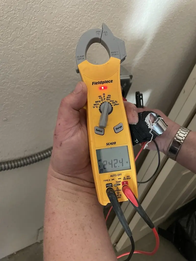 Voltage testing with clamp meter during Generator Installation in Redstone